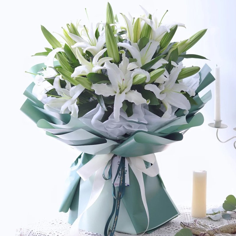 您的微笑-9支多头白百合碧蓝色欧雅纸,内衬白色雪梨纸精美包装